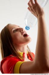 MARTINA BAYWATCH STANDING POSE WITH BOTTLE